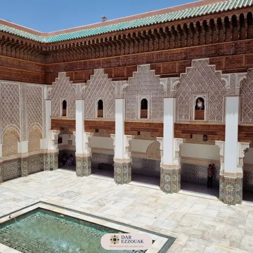 Ben Youssef Madrasa courtyard with carved plaster and geometric patterns