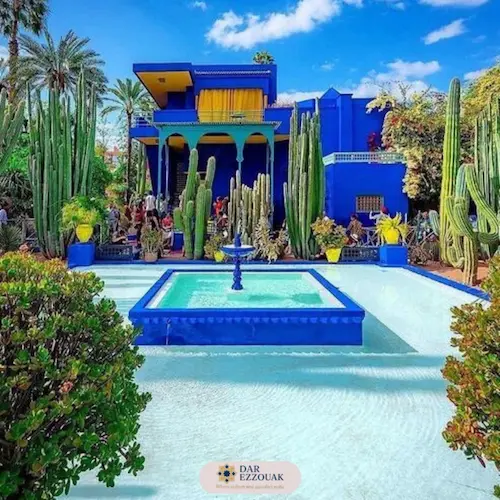 Majorelle Blue villa with tropical plants in Jardin Majorelle